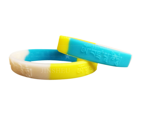 custom made silicone embossed mantra logo wristbands