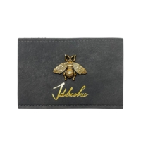 custom leather patch with metal bee pin