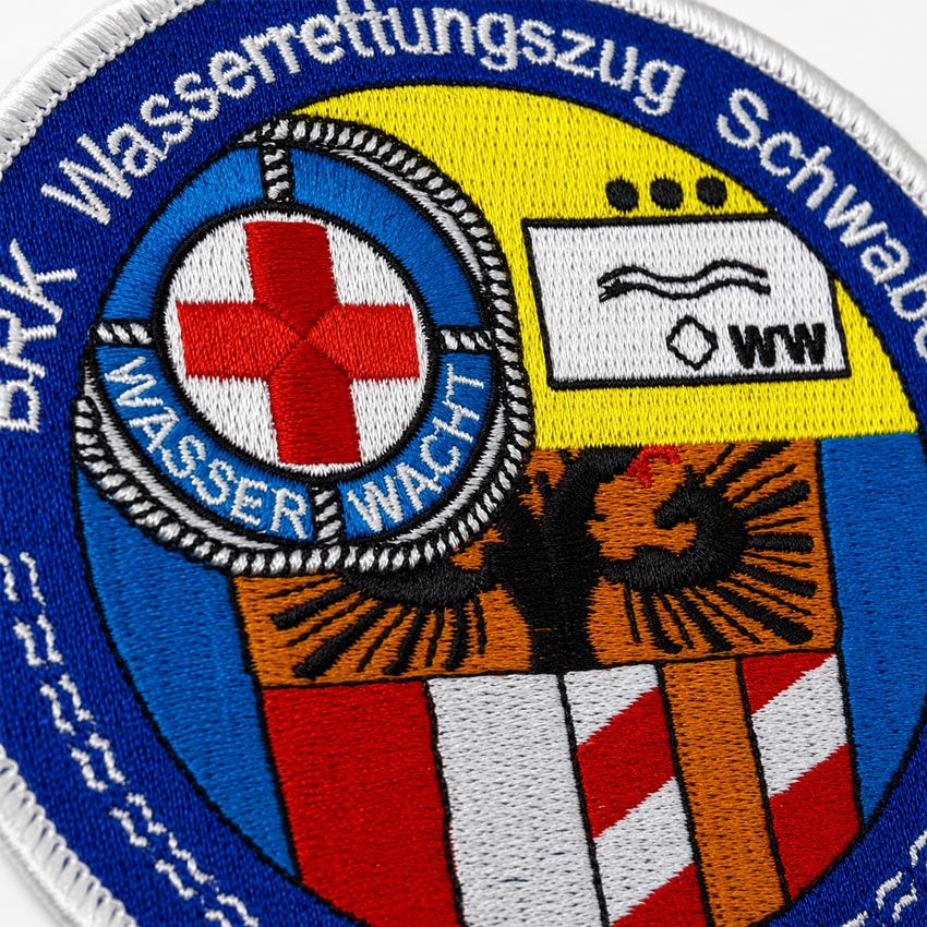Regular thread is the standard choice for custom embroidered patches.