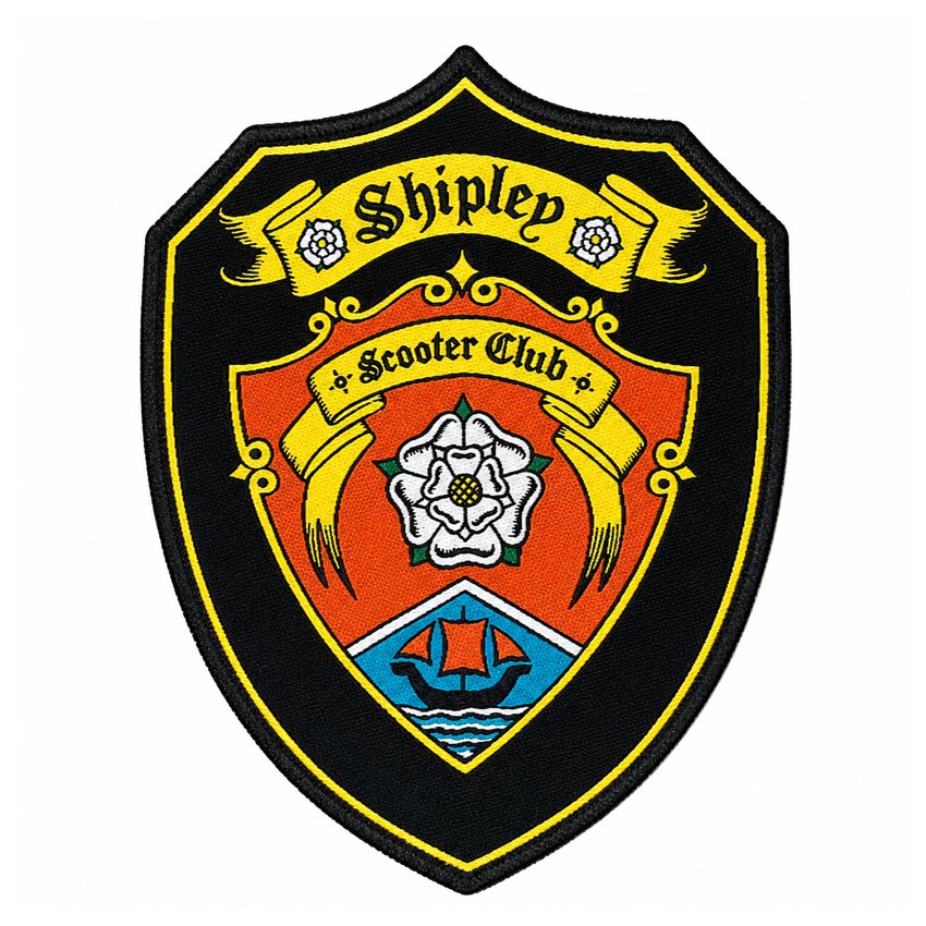 custom-woven-patch-260508-8 Professional shield-shaped woven patch for Shipley Scooter Club featuring a white rose and sailboat emblem, vintage-style biker club clothing accessory.