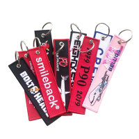 custom embroidered remove before flight key tags