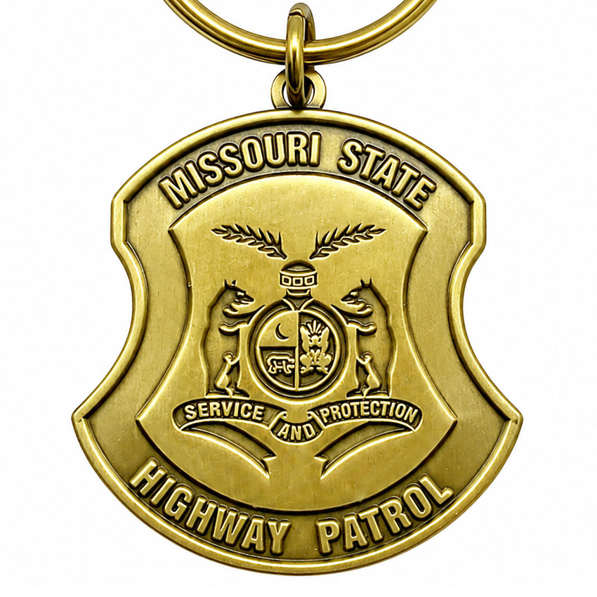 die-struck-keychain Die struck metal keychain with raised and recessed logo details