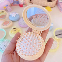 custom logo branded soft air cushion foldable round hair brush with build in mirror