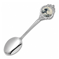 Decorative souvenir spoon with wave artwork insert and silver plated ornamental frame for museum gift shops and collectible retail