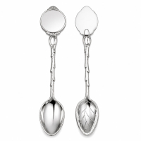 Front and back view of custom decorative souvenir spoon showing metal finish details and spoon structure for OEM customization reference