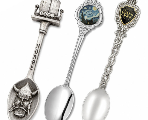 Different custom souvenir spoon styles including antique silver, decorative handle, and branded collectible spoon designs