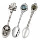 Different custom souvenir spoon styles including antique silver, decorative handle, and branded collectible spoon designs