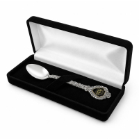 Custom souvenir spoon presented in premium black velvet gift box for commemorative gifts and luxury souvenir collections
