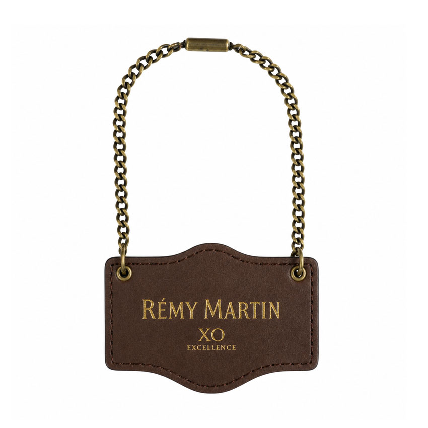 Leather Wine Bottle Tag with Metal Ball Chain Custom leather wine bottle neck tag attached with a metal ball chain on a premium bottle