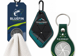 Assorted custom PVC towel holder designs with rectangular, diamond, and round grip styles for sports and promotional applications.