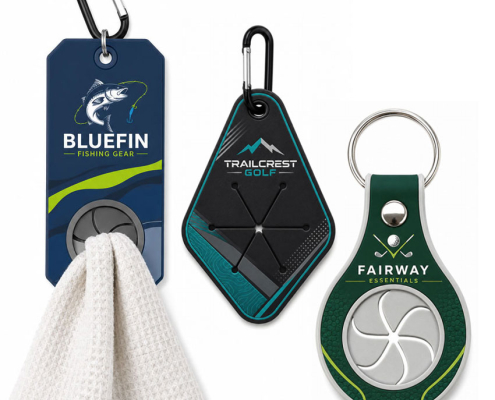 Assorted custom PVC towel holder designs with rectangular, diamond, and round grip styles for sports and promotional applications.