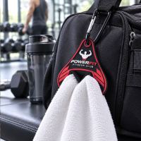 Custom promotional towel holder attached to a gym bag, keeping a workout towel easily accessible for fitness activities.