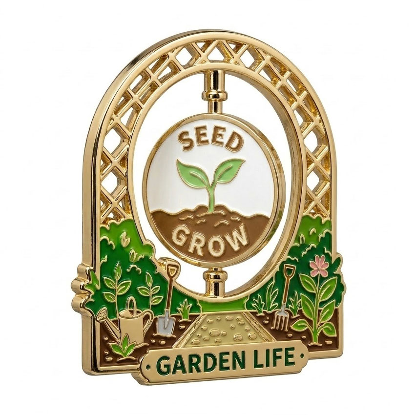 Seed and Grow Flip Spinner Enamel Pin Seed to Grow garden-themed flip spinner pin with botanical enamel details and gold plating