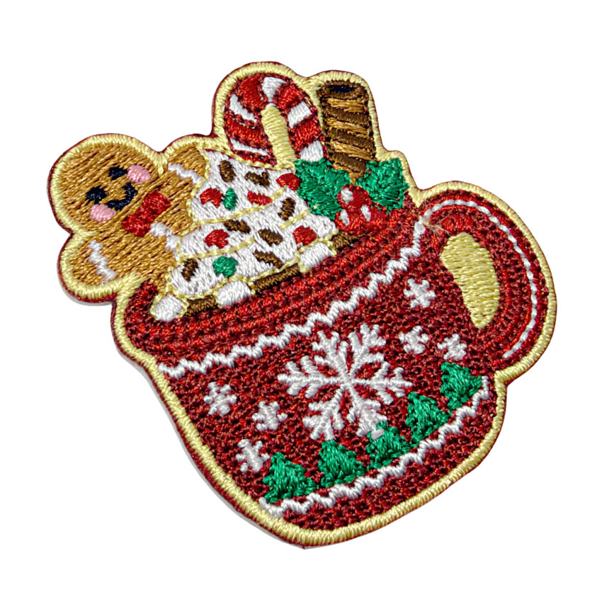 Custom Full Embroidery Christmas Fridge Magnet with Detailed Stitching and Smooth Heat-Cut Edge Close-up of a Christmas cocoa mug embroidered fridge magnet showing detailed stitching, colorful threads and heat-cut border